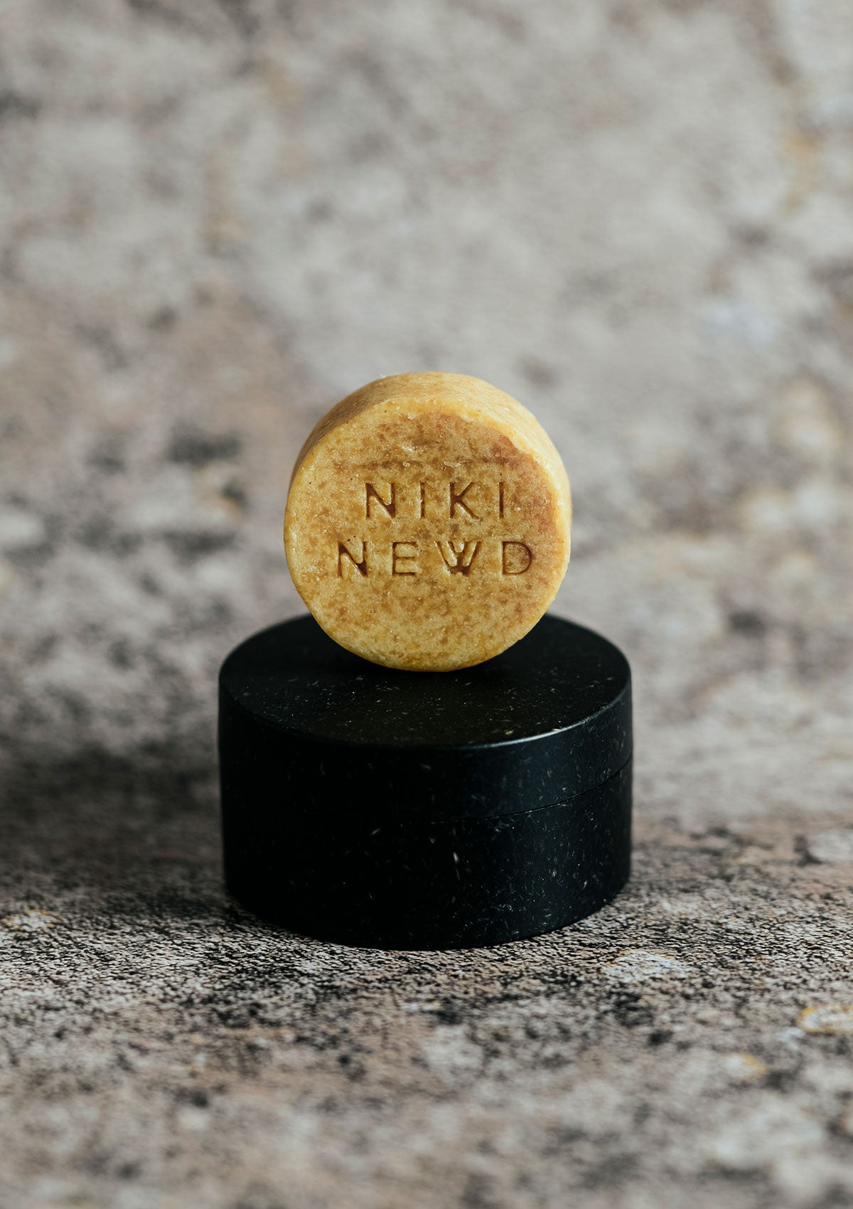 Elegant and protective soap case with Niki Newd® Oatmeal Soap — for clean skincare on the go.