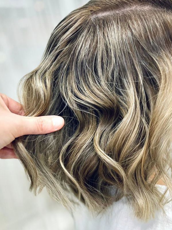 Soft, seamless balayage created at Niki Newd® Hair Studio – naturally blended tones for a radiant and elegant finish.