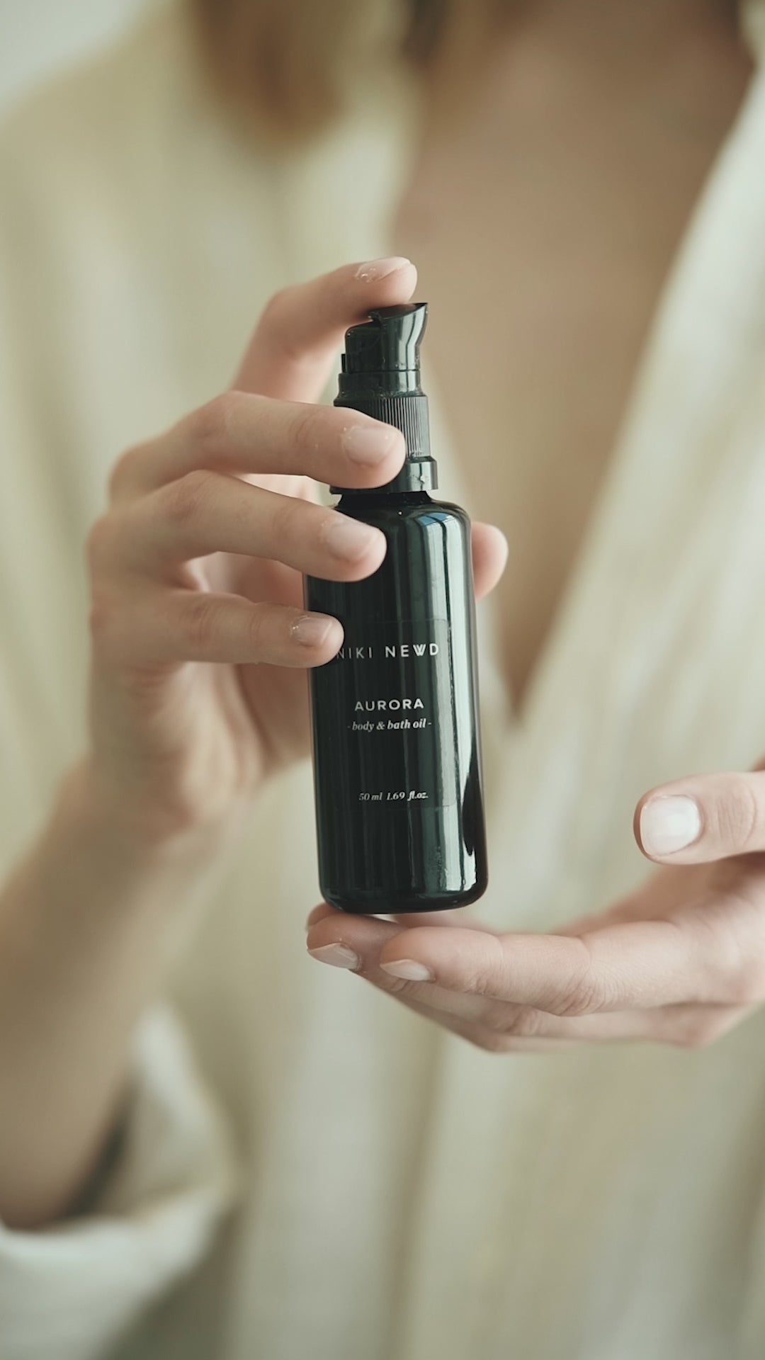 Niki Newd® Aurora – body oil used after shower to lock in moisture and naturally soften dry skin.